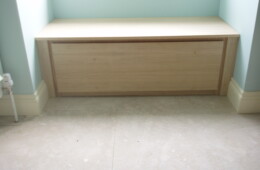 Window seat in oak veneered MDF